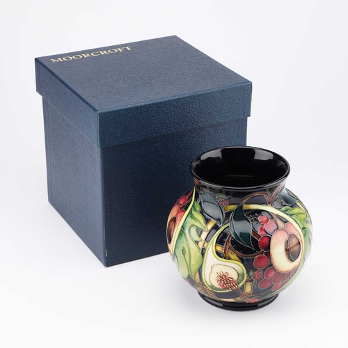 65 - A MOORCROFT POTTERY 'QUEEN'S CHOICE' VASE BY EMMA BOSSONS painted and impressed marks, in a Moorcrof... 