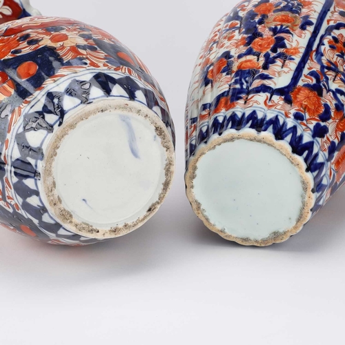 78 - TWO JAPANESE IMARI VASES late 19th/ early 20th Century, the first with an ovoid body rising to a fla... 