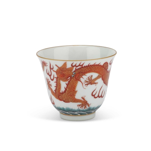 79 - A CHINESE IRON-RED 'DRAGON' WINE CUP bears a six-character mark. 6.5cm highNo chips, cracks or resto... 