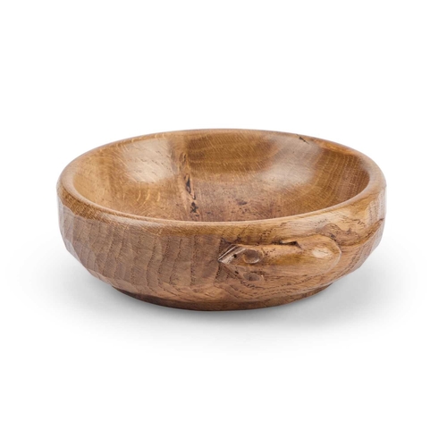 844 - ROBERT THOMPSON OF KILBURN: A MOUSEMAN OAK NUT BOWL circular, with adzed exterior and carved mouse s... 