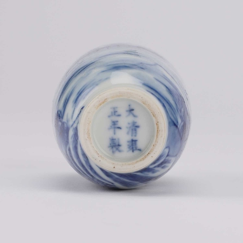 86 - A CHINESE BLUE AND WHITE SNUFF BOTTLE the ovoid body painted in the round with a river landscape, be... 