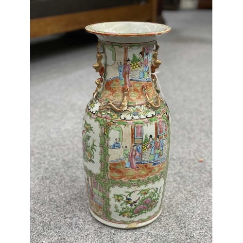 87 - A CHINESE CANTON FAMILLE ROSE VASE, 19TH CENTURY enamel painted in the characteristic palette with f... 