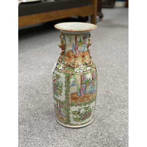 87 - A CHINESE CANTON FAMILLE ROSE VASE, 19TH CENTURY enamel painted in the characteristic palette with f... 