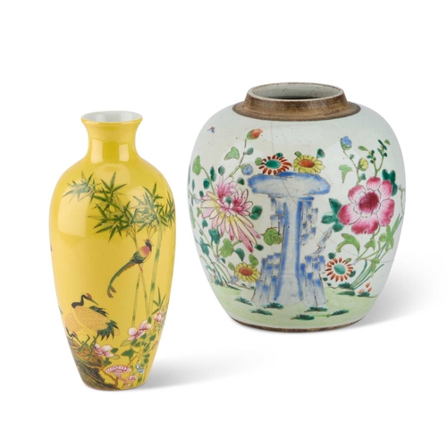 90 - A CHINESE FAMILLE ROSE GINGER JAR painted with flowers and rockwork; together with a Chinese yellow ... 