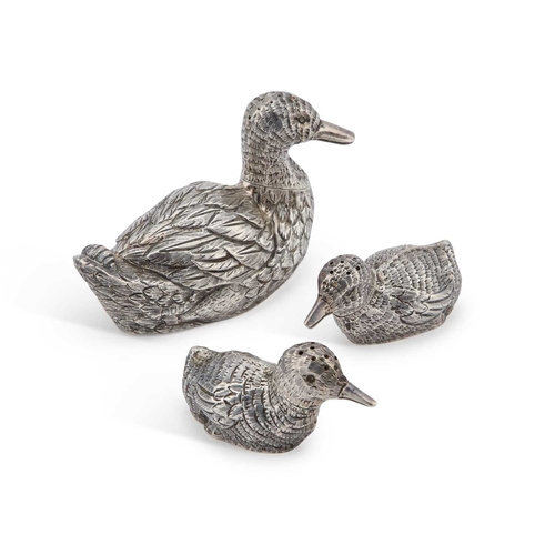 293 - A TRIO OF EDWARDIAN SILVER NOVELTY PEPPERETTES by William Edward Hurcomb, London 1906, modelled as a... 