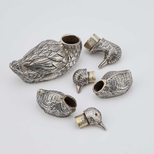 293 - A TRIO OF EDWARDIAN SILVER NOVELTY PEPPERETTES by William Edward Hurcomb, London 1906, modelled as a... 