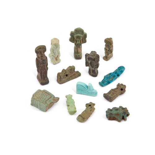 10 - A COLLECTION OF ANCIENT EGYPTIAN AMULETS various sizes and forms. (13)