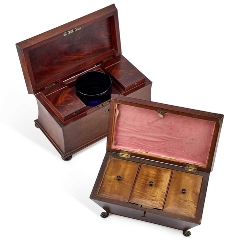 1179 - A 19TH CENTURY MAHOGANY TEA CADDY of sarcophagus form with waisted sides, the interior with a pair o... 