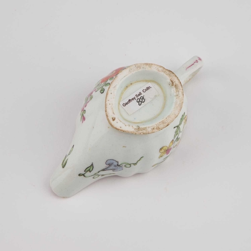 122 - A BOW CREAMBOAT, CIRCA 1760 the fluted body painted with sprays of flowers. 10.5cm longProvenance: G... 