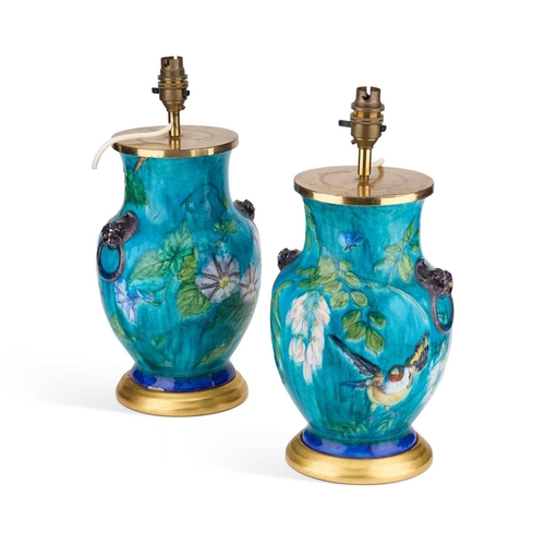 123 - A PAIR OF AESTHETIC POTTERY TABLE LAMPS, IN THE MANNER OF THEODORE DECK each vase with moulded zoomo... 