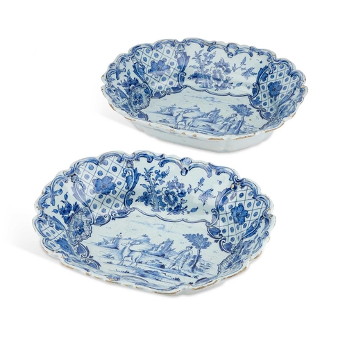 132 - A PAIR OF DUTCH DELFT BLUE AND WHITE DISHES, CIRCA 1760 Johannes van Duyn, each with moulded scroll ... 