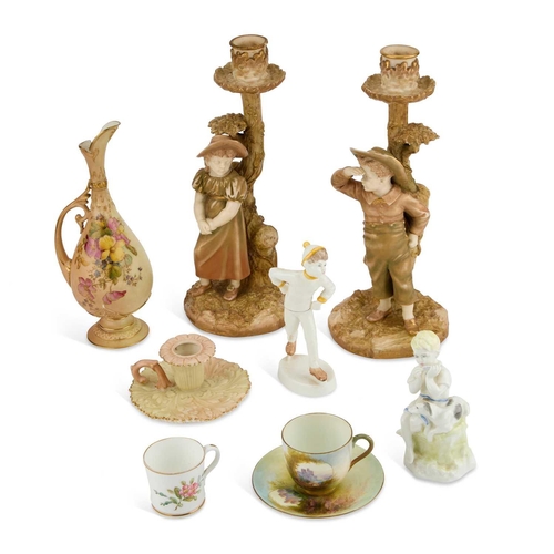 140 - A COLLECTION OF ROYAL WORCESTER including a pair of Hadley figural candlesticks, two figures, a hand... 