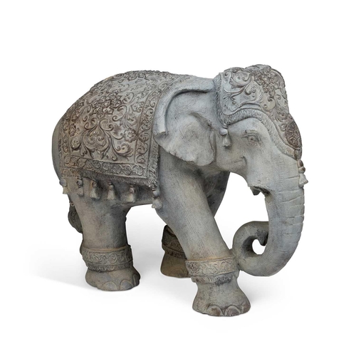 170 - A LARGE PAINTED COMPOSITION MODEL OF AN ELEPHANT modelled as a walking caparisoned Asian Elephant. 5... 