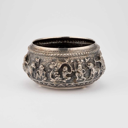 190 - A 20TH CENTURY BURMESE SILVER BOWL probably Rangoon, circular, embossed decoration of Ramayana scene... 