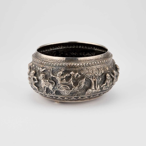 190 - A 20TH CENTURY BURMESE SILVER BOWL probably Rangoon, circular, embossed decoration of Ramayana scene... 