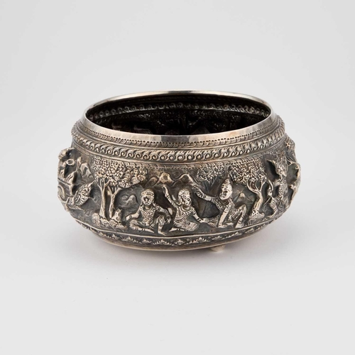 190 - A 20TH CENTURY BURMESE SILVER BOWL probably Rangoon, circular, embossed decoration of Ramayana scene... 