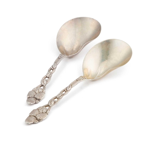 198 - TIFFANY & CO: A PAIR OF AMERICAN STERLING SILVER 'STRAWBERRY' PATTERN SERVING SPOONS by Tiffany &... 