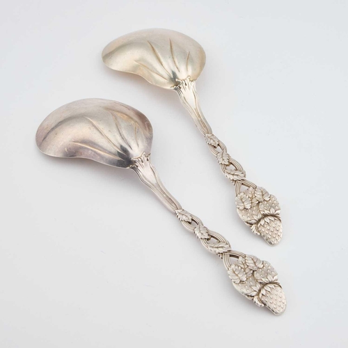 198 - TIFFANY & CO: A PAIR OF AMERICAN STERLING SILVER 'STRAWBERRY' PATTERN SERVING SPOONS by Tiffany &... 