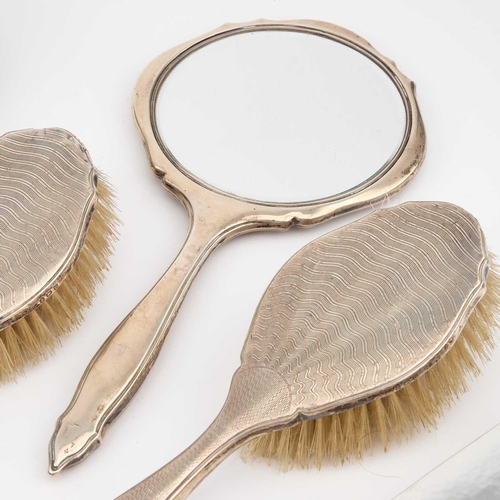 202 - A COLLECTION OF AMERICAN AND ENGLISH SILVER-MOUNTED DRESSING TABLE BRUSHES AND MIRROR (11) Mirror 27... 