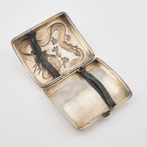 217 - A CHINESE SILVER CIGARETTE CASE retailed by Wang Hing & Co, Hong Kong, late 19th/ early 20th Cen... 