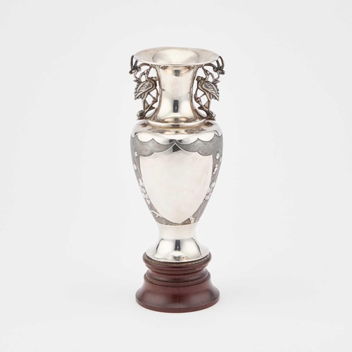 221 - A CHINESE SILVER VASE by Zeng, Shanghai, c.1900, of baluster form, chased with a parrot perched on a... 