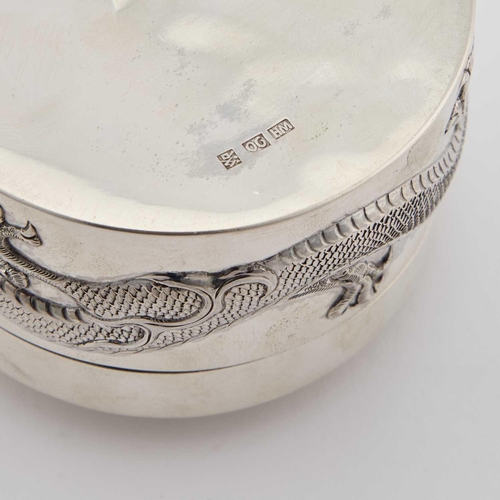 231 - A CHINESE SILVER CIRCULAR BOX AND COVER by Luo, Canton and Hong Kong, retailed by Wang Hing & Co... 