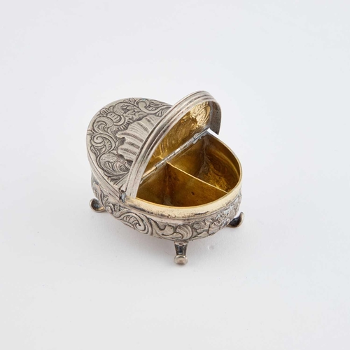 260 - A SMALL CONTINENTAL SILVER BOX 18th/ 19th Century, oval with double hinged covers, raised on scroll ... 