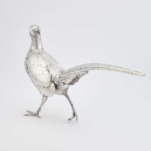 275 - A BELGIAN SILVER TABLE MODEL OF A COCK PHEASANT the cast bird realistically modelled standing with w... 