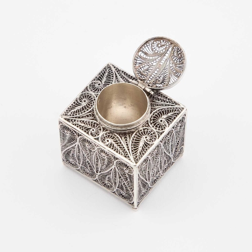 280 - A SMALL SILVER FILIGREE INKWELL indistinctly marked on the underside, cube-like with a hinged circul... 