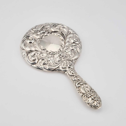 294 - A VICTORIAN STYLE SILVER HAND-MIRROR by W I Broadway & Co, Birmingham 1962, boldly chased with s... 