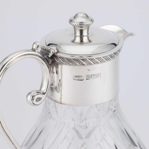 305 - AN ELIZABETH II SILVER-MOUNTED CUT-GLASS CLARET JUG by F G Flavell Ltd, Birmingham 1979, the silver ... 