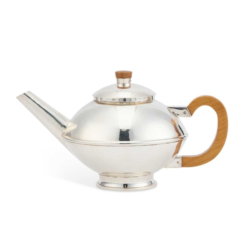 314 - AN ELIZABETH II SILVER TEAPOT maker FE, London 2000, circular, with a wooden handle and knop. 27cm l... 