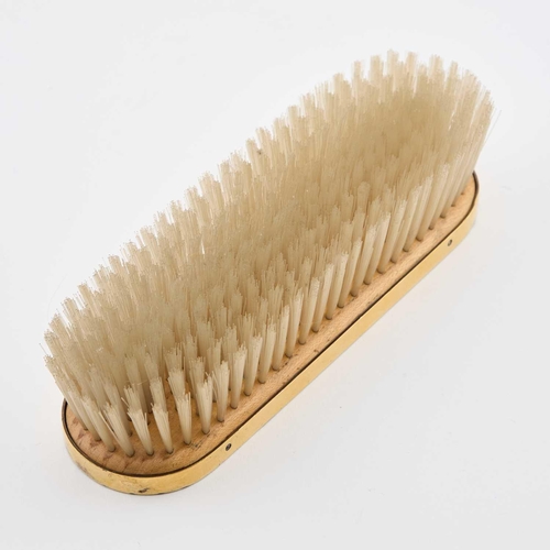 323 - A GEORGE VI SILVER-GILT CLOTHES BRUSH by Cartier Ltd, London 1948, rectangular with rounded ends, de... 