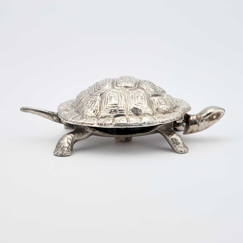 335 - A GEORGE V SILVER NOVELTY TABLE BELL by Grey & Co, Chester 1929, realistically modelled as a tor... 