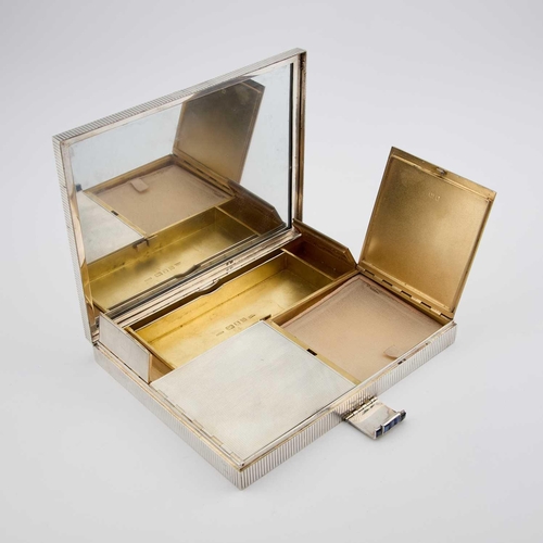 338 - ASPREY: AN ART DECO LARGE SILVER VANITY BOX by Asprey & Co Ltd, London 1935, the rectangular eng... 