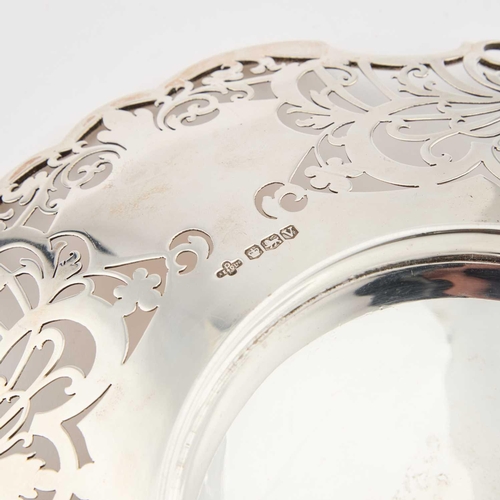 347 - A GEORGE VI PIERCED SILVER FRUIT DISH by A E Poston & Co Ltd, Sheffield 1938, of shaped circular... 