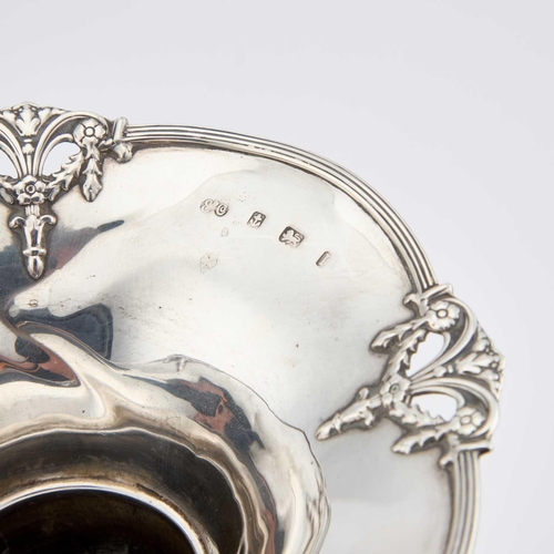 366 - A GEORGE V SILVER VASE by Elkington & Co Ltd, Birmingham 1912, the circular base rising to a tap... 