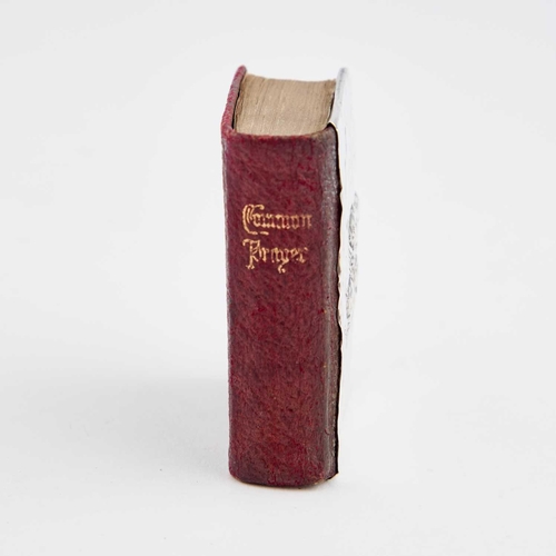 393 - AN EDWARDIAN SILVER-MOUNTED MINIATURE PRAYER BOOK by Green & Cadbury Ltd, Birmingham 1904. 5.6cm... 