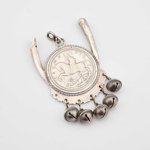 400 - OMAR RAMSDEN: A RARE ARTS AND CRAFTS SILVER BABY'S RATTLE by Omar Ramsden, London 1937, with a centr... 