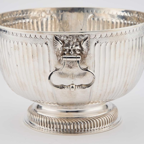 421 - A LARGE VICTORIAN SILVER BOWL by Daniel & John Wellby, London 1899, of fluted circular form with... 