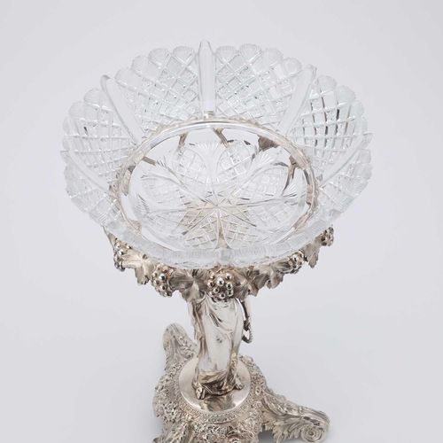 437 - A GEORGE IV SILVER TABLE CENTREPIECE maker SJ?, London 1825, the cut-glass circular bowl raised on a... 