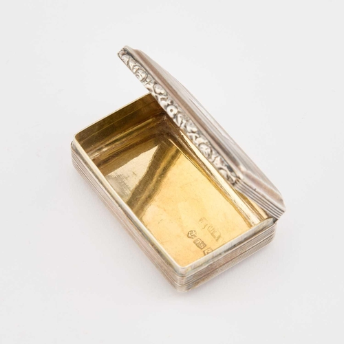 445 - A GEORGE IV SILVER SNUFF BOX by Thomas Shaw, Birmingham 1828, rectangular with a hinged cover, reede... 