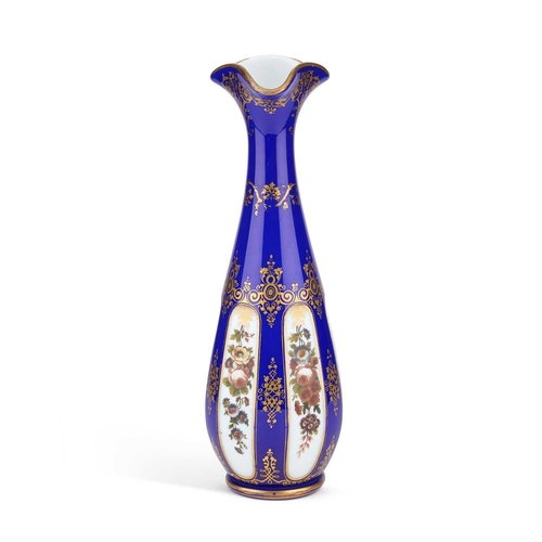 46 - A BACCARAT OPALINE VASE, 19TH CENTURY decorated with flower sprays between gilt foliate scroll borde... 