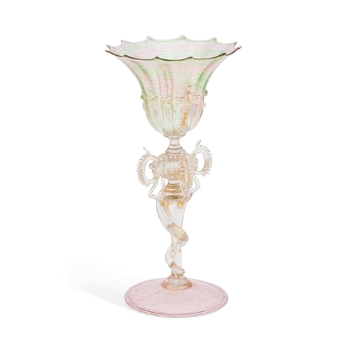47 - A RARE VENETIAN 'SERPENT STEM' GOBLET, CIRCA 1775 the deep flared bowl with twelve rim points and tw... 
