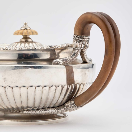 498 - § A GEORGE III SILVER TEAPOT by William Burwash, London 1818, of squat circular form, the flat hinge... 