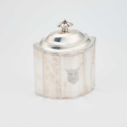 517 - A GEORGE III SILVER TEA CADDY by Peter & Ann Bateman, London 1796, of shaped oval form, the hing... 