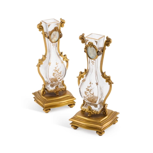 52 - A FINE PAIR OF 19TH CENTURY GILT-BRONZE AND GLASS VASES each square-section baluster glass vase gilt... 