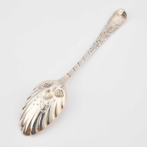 525 - A GEORGE III SILVER TABLESPOON by Hester Bateman, London 1787, the gilded bowl now decorated with be... 