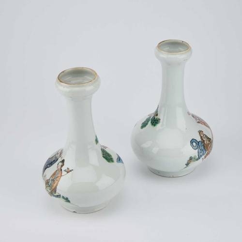 593 - A PAIR OF CHINESE GARLIC-MOUTH VASES each squat rounded bodies painted with figures. (2) 20cm highOn... 