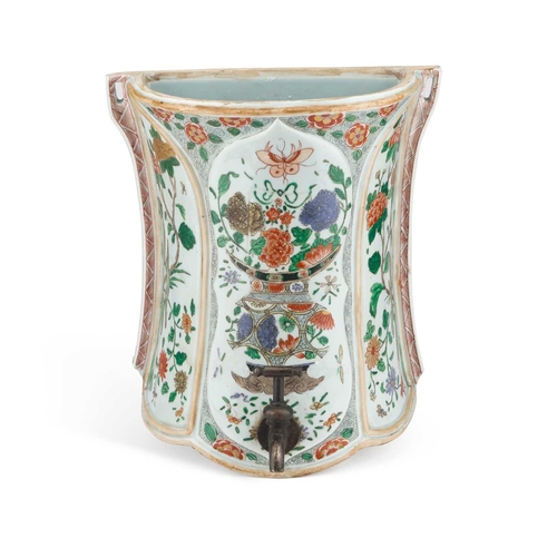 599 - A FAMILLE VERTE WALL-MOUNTED CISTERN the waisted body with moulded panels, enamel painted with a vas... 